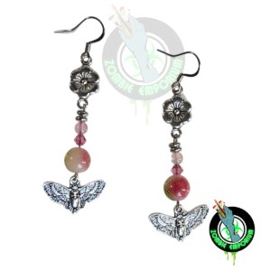 Watermelon Tourmaline and Death Moth earrings displayed on a white background with the Zombie Emporium logo.